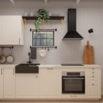 Kleine weiße IKEA Landhausküche mit schwarzer Spüle, offenen Regalen und moderner schwarzer Dunstabzugshaube