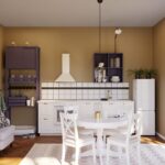 Gemütliche IKEA Wohnküche mit weißen Küchenfronten, warmen Wandfarben und Vintage-Einrichtung